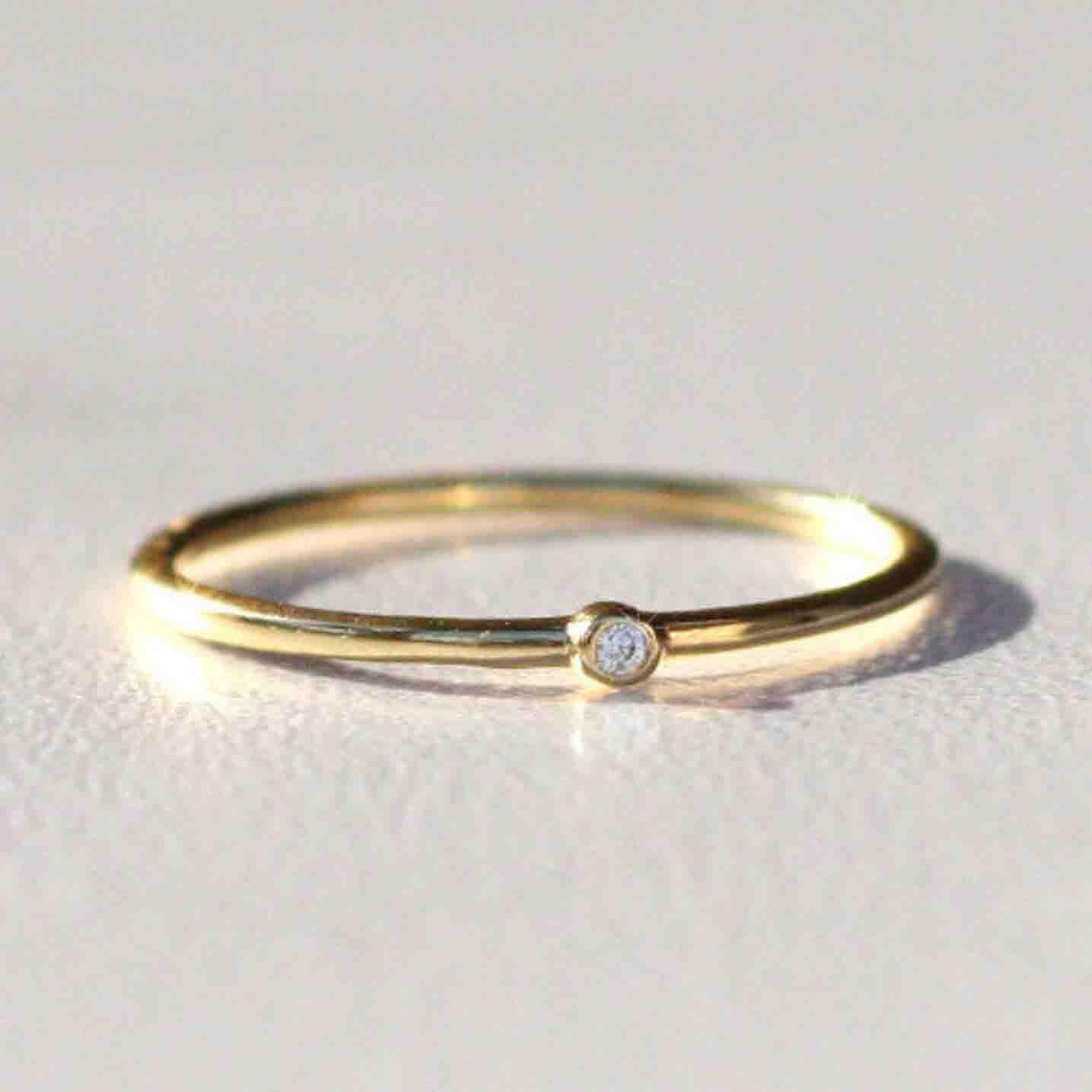 Gold ring clearance with tiny diamond