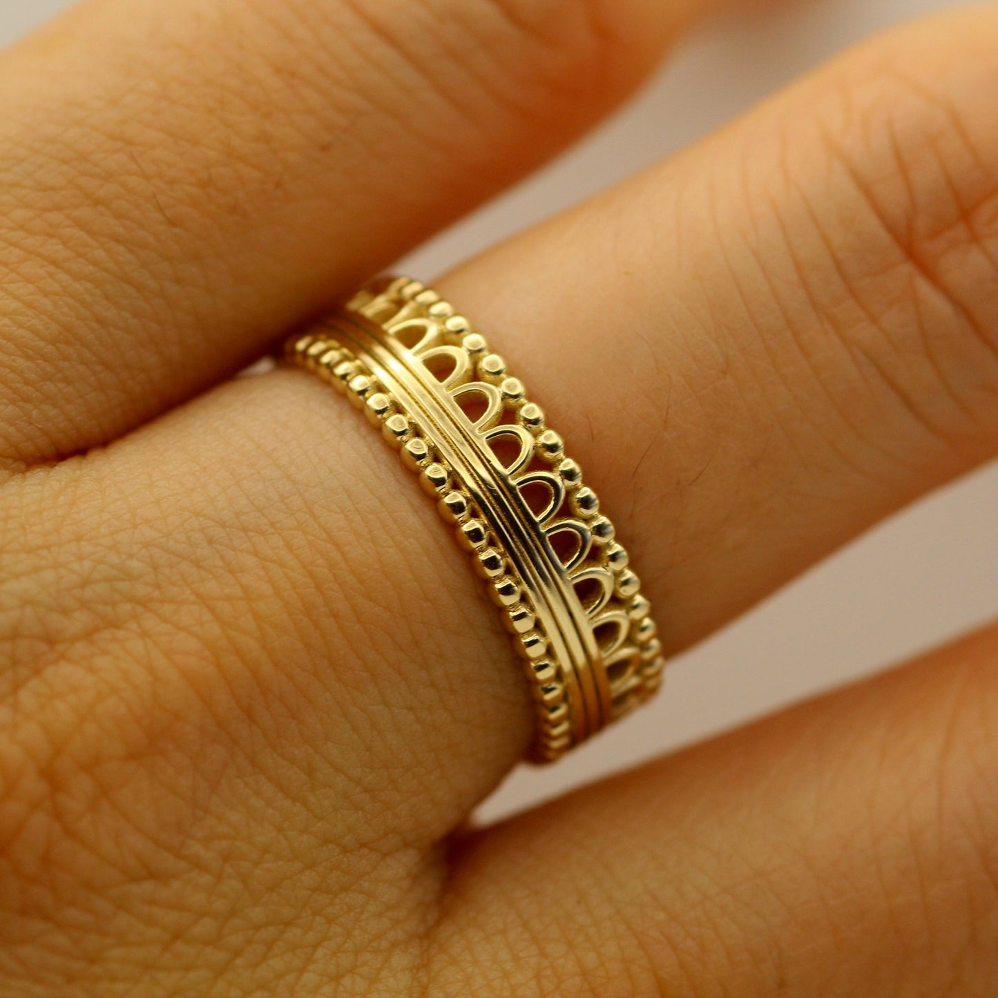 Discover the elegance of our 24k Antique Lace Pattern Gold Ring, an heirloom-quality piece that blends intricate craftsmanship with luxurious 24k gold. Featuring a delicate lace-inspired design, this ring evokes timeless beauty and sophistication. Its vintage-inspired pattern, combined with the pure gold composition, creates a stunning visual impact, perfect for those who appreciate fine details and enduring elegance.

Whether as a symbol of love, a gift for a special occasion, or a luxury addition to your 