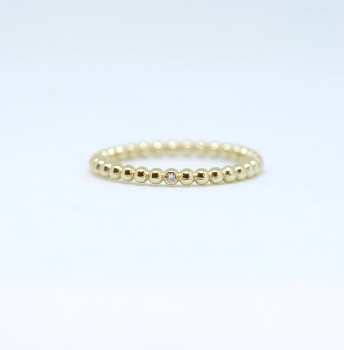 14k Tiny Diamond Eternity Wedding Band.